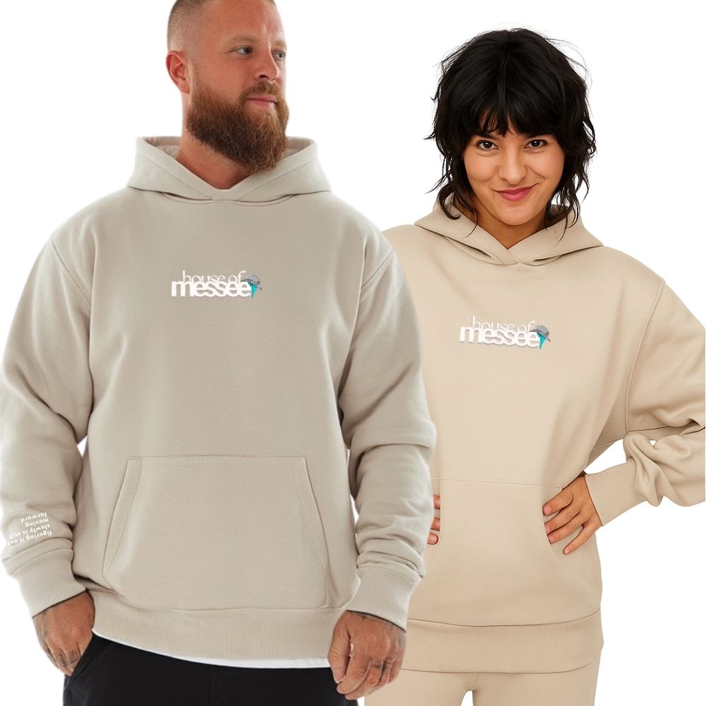Two people wearing beige hoodies with a visible brand logo on a white background