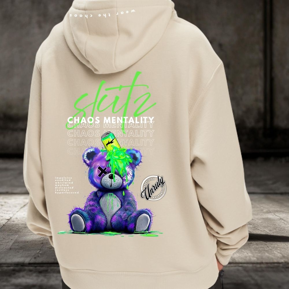 Beige hoodie with a colorful bear graphic and text on the back, worn by a person.